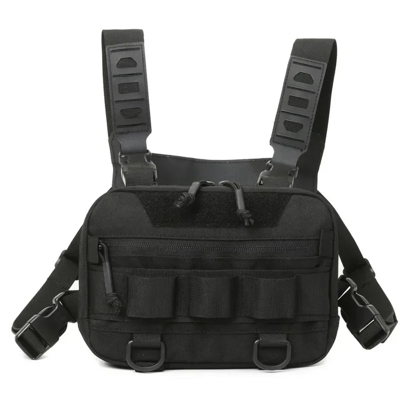 Front view of Rovix tactical EDC chest bag in all black with zip pocket, MOLLE straps, D-rings, and adjustable shoulder harness.
